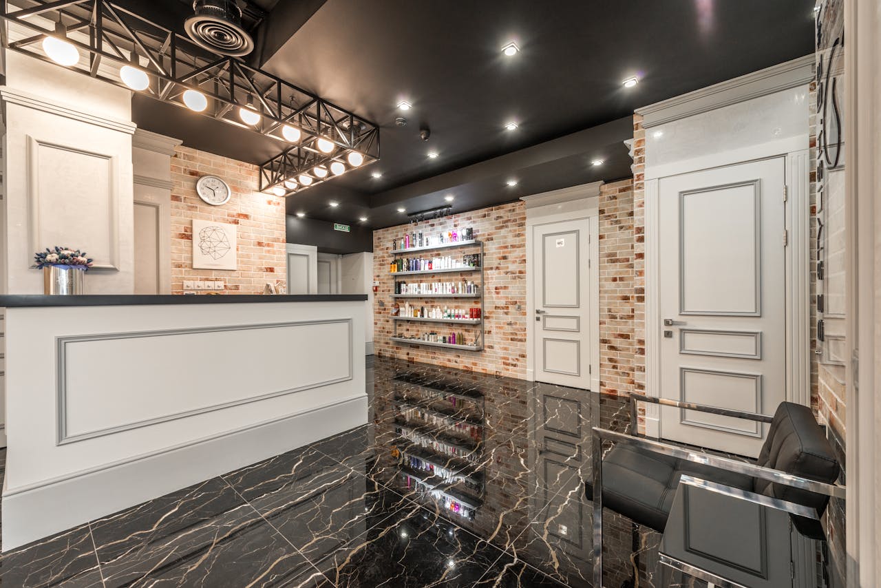 Elegant interior of a modern beauty salon with chic decor and inviting atmosphere.
